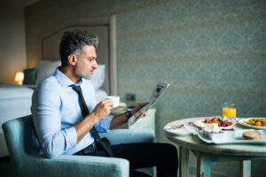 Hotel hotel toruń mature businessman having breakfast in a hotel roo 2022 02 02 05 05 59 utc